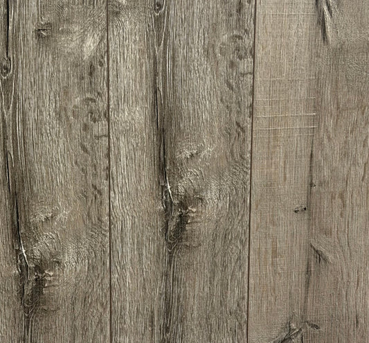 Swiss Krono Grey Oak MV 803 10mm laminate planks with grey-brown oak grain and knots