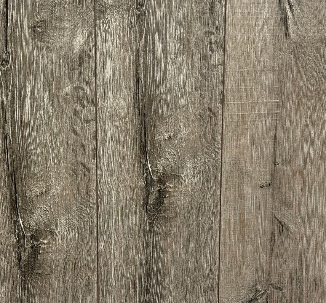 Swiss Krono Grey Oak MV 803 10mm laminate planks with grey-brown oak grain and knots
