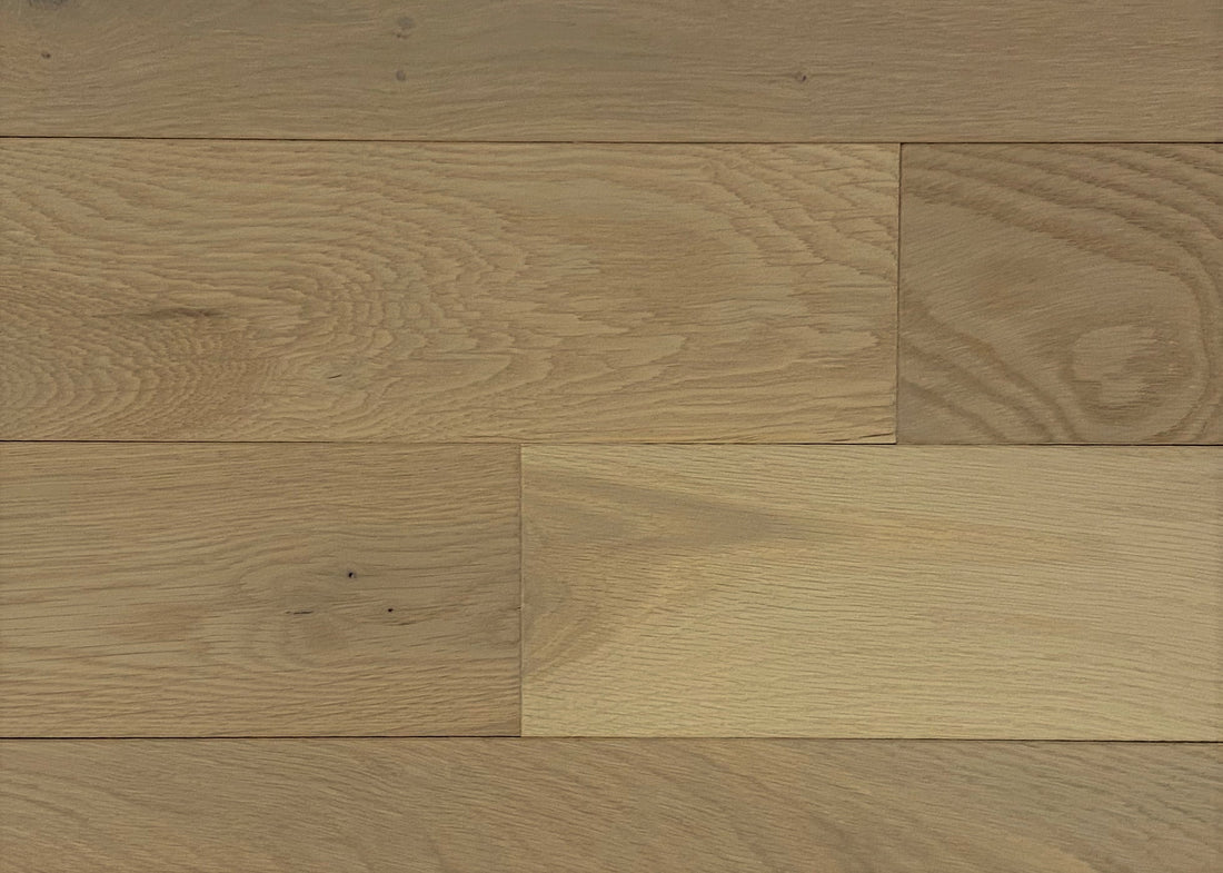 Close view of Appalachian Paisley White Oak solid hardwood planks in a soft grey-brown tone