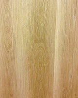Close-up of Riche Blonde Sand Oak 6mm SPC vinyl plank flooring showing its light natural oak grain