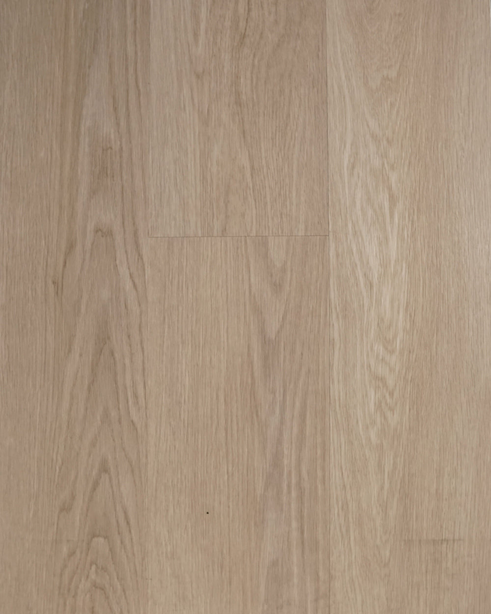 Riche Flooring Heavy-Duty Driftwood Mist SPC vinyl planks with a pale greige oak-look woodgrain