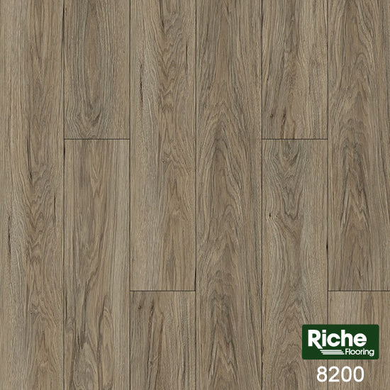 Riche Greige Oak SPC vinyl plank flooring, a floor of grey-brown greige oak planks