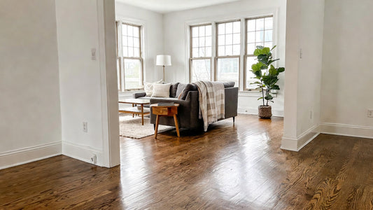 Refinished hardwood floor in a Toronto living room – before and after comparison | Top Floorings Depot